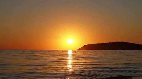 Tranquil summer bay at dusk Stock Footage 323433030