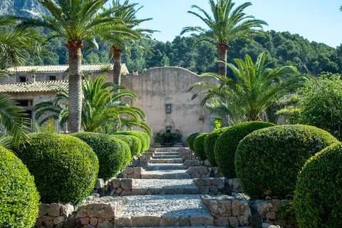 A tranquil summer scene featuring a charming Spanish country house Stock Photos
