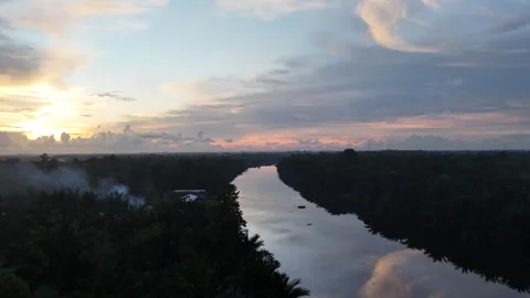 Tranquil Sunset Aerial View Over Winding Kapuas River and Forest Stock Footage 334172154