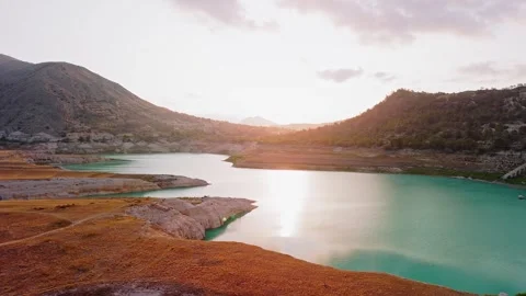 Tranquil Sunset Drone View of Mountain Lake in Spain Stock Footage 314606080