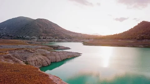 Tranquil Sunset Drone View of Mountain Lake in Spain Stock Footage 314606094