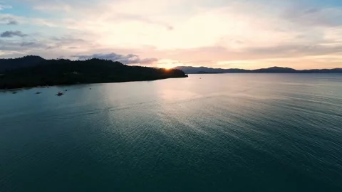 Tranquil sunset over calm sea and forested coastline in Palawan, Philippines Stock Footage 319670958