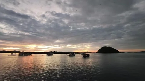 Tranquil Sunset Over Calm Waters at Kalong Island Stock Footage 279871384