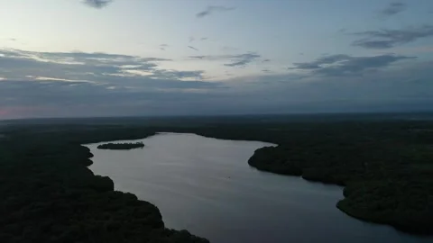 Tranquil Sunset over a Coastal Lagoon Stockbeeldmateriaal 288393499