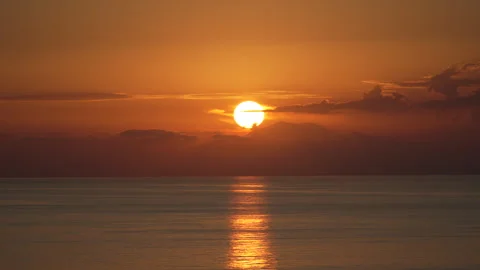 Tranquil Sunset Over the Serene Sea Stock Footage 287597692