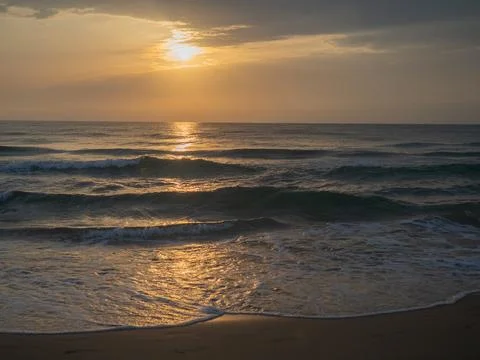 Tranquil Sunset by the Sea Stock Photos