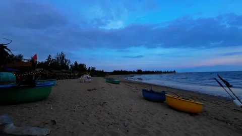 Tranquil Sunset Sky Over Traditional Basket Boat On Beach Stock Footage 339317254
