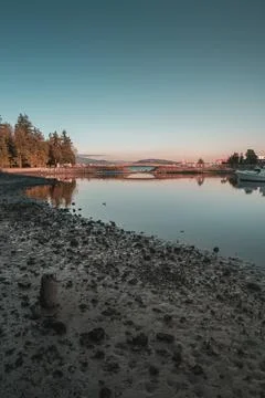 Tranquil sunset by the water Stock Photos