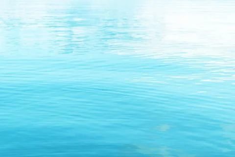 Tranquil surface texture of the ocean. Water ripples. Blue sea water in cal.. Stock Photos