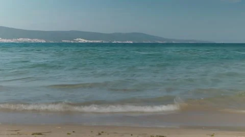 Tranquil turquoise shore at empty bay timelapse Stock Footage 336008509