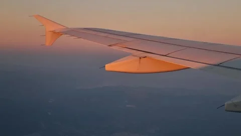 A tranquil view from an aircraft window as the plane glides over Greece at Stock Footage 346421186