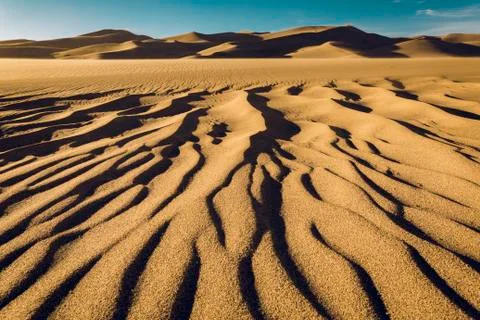 Tranquil view of wave pattern on sand at Great Sand Dunes National Park against Stock Photos