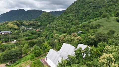 Tranquil Village Landscape with Storm Clouds Stock Footage 315877784