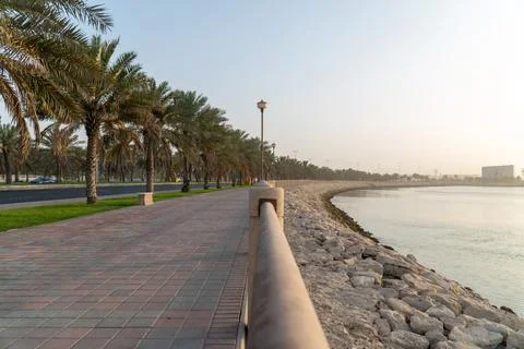 Tranquil Waterfront Pathway Stock Photos