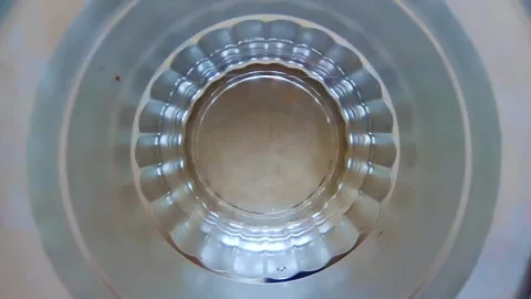 The tranquil water's surface in a glass. Stock Footage 253722036