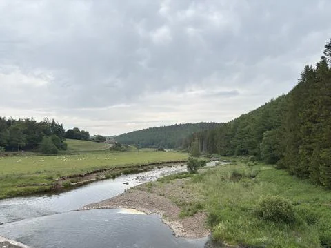 Tranquil Whiteadder Water winds through the Scottish Borders Stock Photos