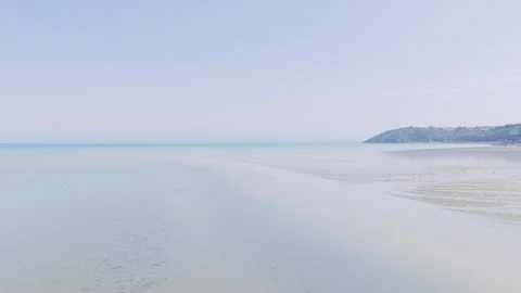 A tranquil, wide-angle shot of Binic beach on the Brittany coast in France Stock Footage 346666478