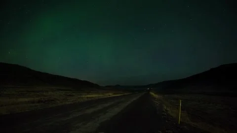 Tranquil Winter Forest Bathed in Radiant Northern Lights. Serene Aurora Borealis 動画素材 334658782