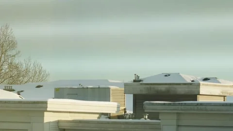 Tranquil Winter Rooftops Covered in Snow at Dusk Stock Footage 271200752