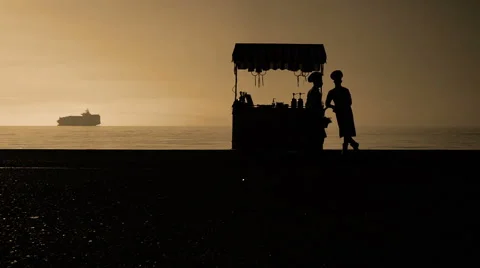 Tranquility Cinematic Slow Motion scene of Silhouettes of ordinary People Stock Footage 57272656