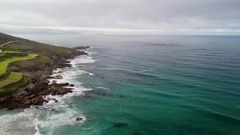 Tranquility Scene Of Ocean Waves Gently Splashing On Rocky Shore, Spain. aerial Stock Footage 243095500