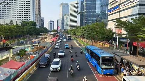 Trans Jakarta Buses at Bus Stops. Stock Footage 248907891