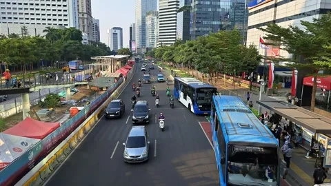 Trans Jakarta Buses at Bus Stops. Stock Footage 248907920