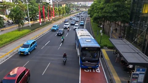 Trans Jakarta Buses at Bus Stops. Stock Footage 248907923