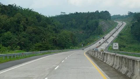 Trans Java toll road KM 449 at noon Stock Photos