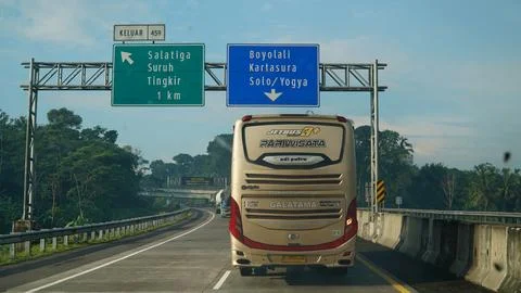 Trans Java toll road at noon. There are signs for the city of Salatiga, Yog.. 写真素材
