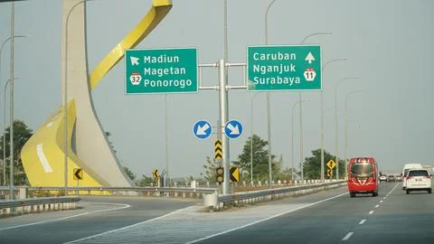 Trans Java toll road. There is a sign in the direction of Madiun, Magetan, .. Stock Photos