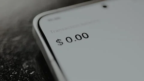 Transaction amount of 0.00 US dollars from a digital payment interface on a Stock Footage 328880689