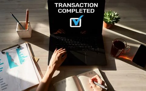 Transaction completed message on screen. Digital banking and online payment Stock Photos
