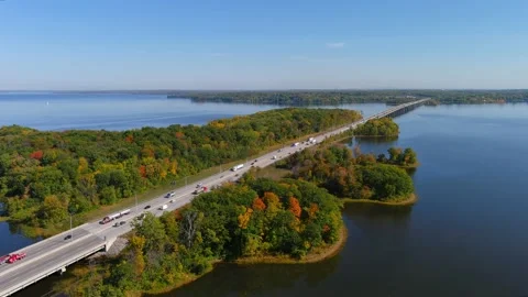 Transcanada highway, Lake of Two Mountains Bridge and fall season colors in t Stock Footage 162622073