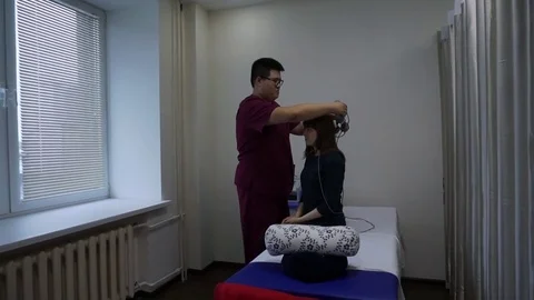Transcranial magnetic stimulation of the head. Stock Footage 81458652