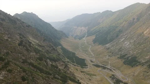 Transfagarasan highway and mountains in Romania high view - filmed from a drone Stock Footage