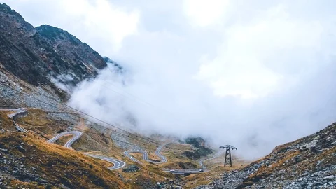 Transfagarasan road dramatic clouds timelapse video Stock Footage 99430040