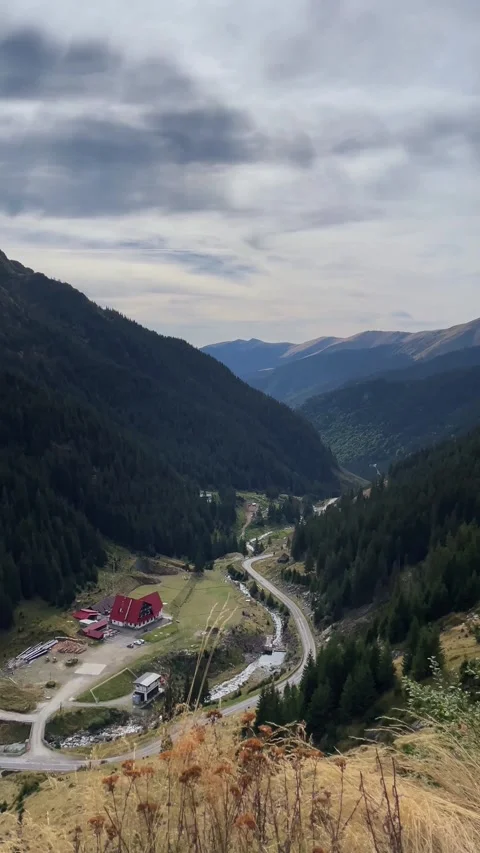Transfagarasan Road Through a Mountain Valley in the Fagaras Mountains, Romania Stock Footage 340396217