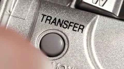 Transfer Button Pressed On Silver Device Close Up Stock Footage 332974741