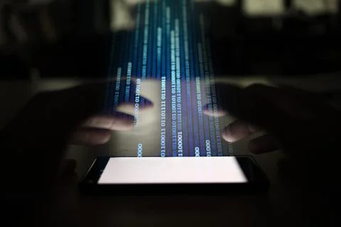 Transfer data via mobile device. smart phone with blue working hands and doub Foto stock