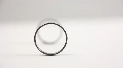 Transfer focus from one silver ring to the distant one, stand one after other Видео 57197400