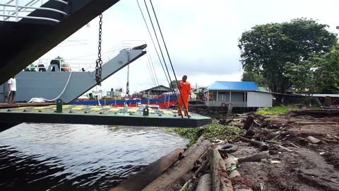 Transfer of goods from ship to ship Stock Footage 147424534