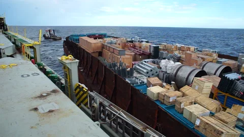 Transfer of goods from ship to ship Stock Footage 147425374