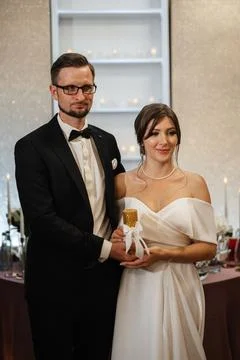 Transfer of wedding fire with the help of candles from mothers Stock Photos