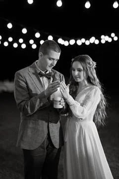Transfer of wedding fire with the help of candles the newlyweds Stock Photos