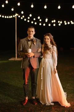 Transfer of wedding fire with the help of candles the newlyweds Stock Photos