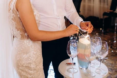 Transfer of wedding fire with the help of candles the newlyweds Stock Photos