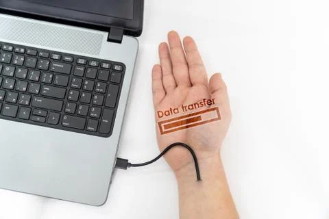 Transfering data concept with bionic hand with cable Stock Photos