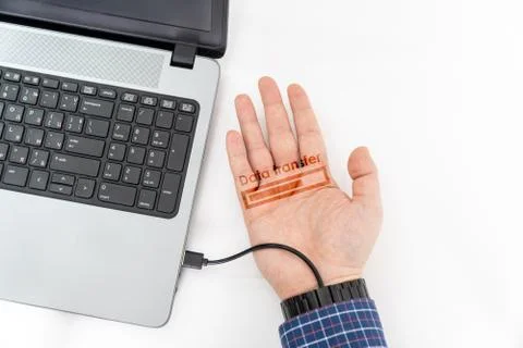 Transfering data concept with bionic hand with cable Stock Photos