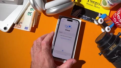Transferring Apps and Data to iPhone from iCloud on New Apple Computer Stock Footage 263266353